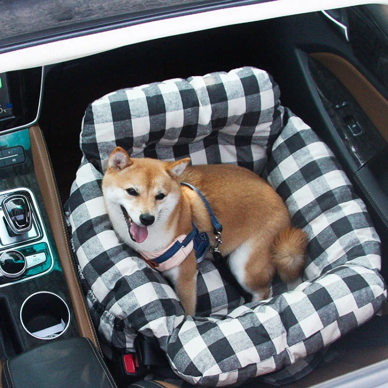 Dog settled in the TravelBuddy car seat bed