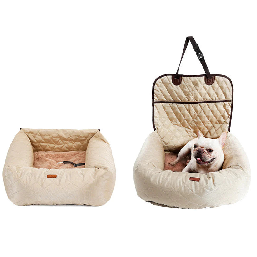 Dog resting in the SafeRide car bed on a back seat