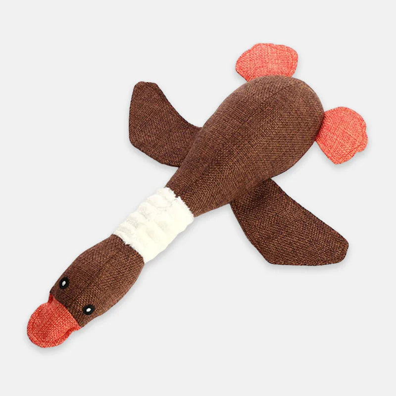 Dog chewing on the ToughGoose durable toy