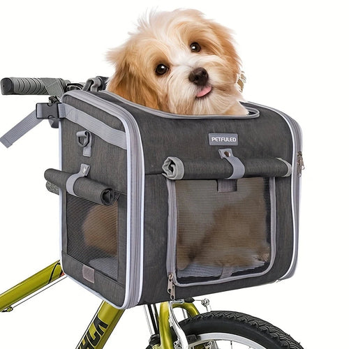 Dog carrier mounted on a bicycle handlebar
