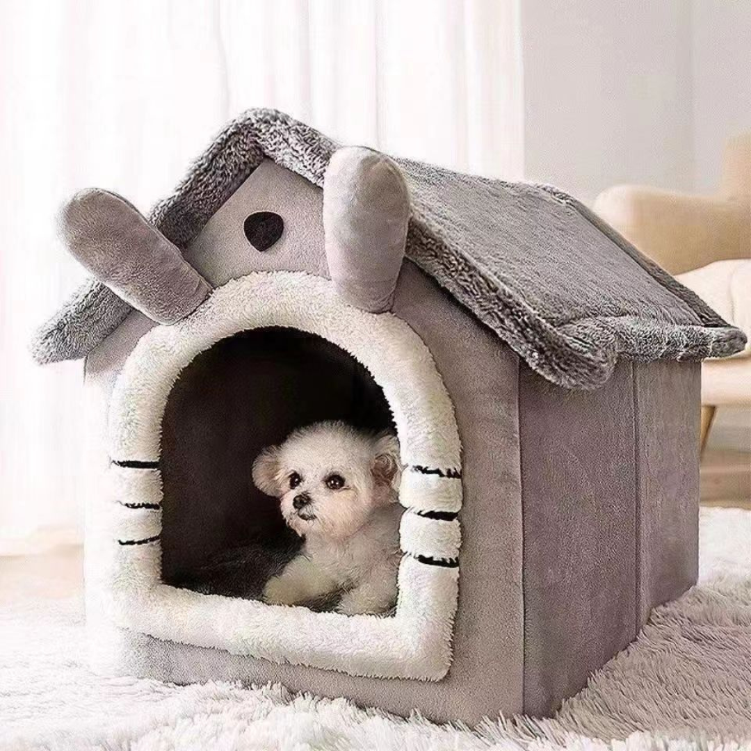 Cat curled up inside the plush house