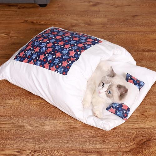 Cat inside the CuddleBag sleeping bag