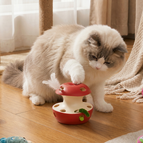 3-in-1 apple-shaped interactive cat toy with feather and ball