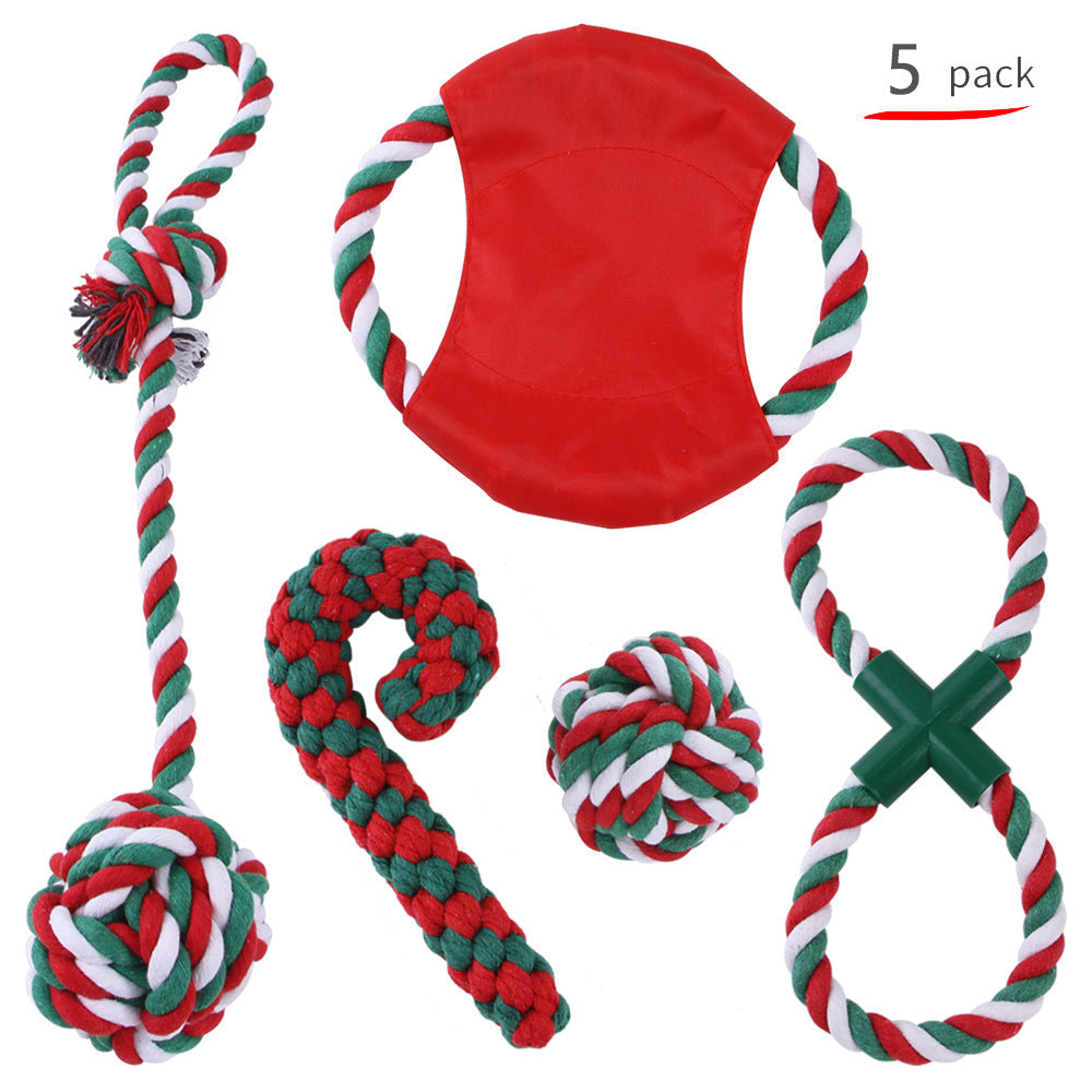Dog tugging the knotted rope toy