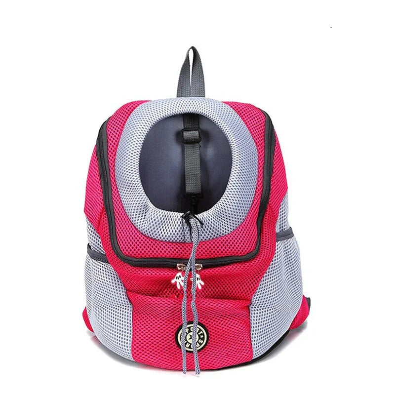 Person carrying a small dog in the BuddyPack backpack