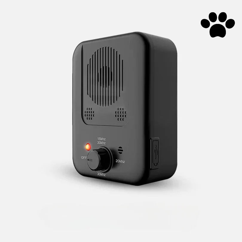 QuietHound bark deterrent mounted on a fence outdoors