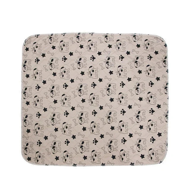 Washable pet pad with paw print design