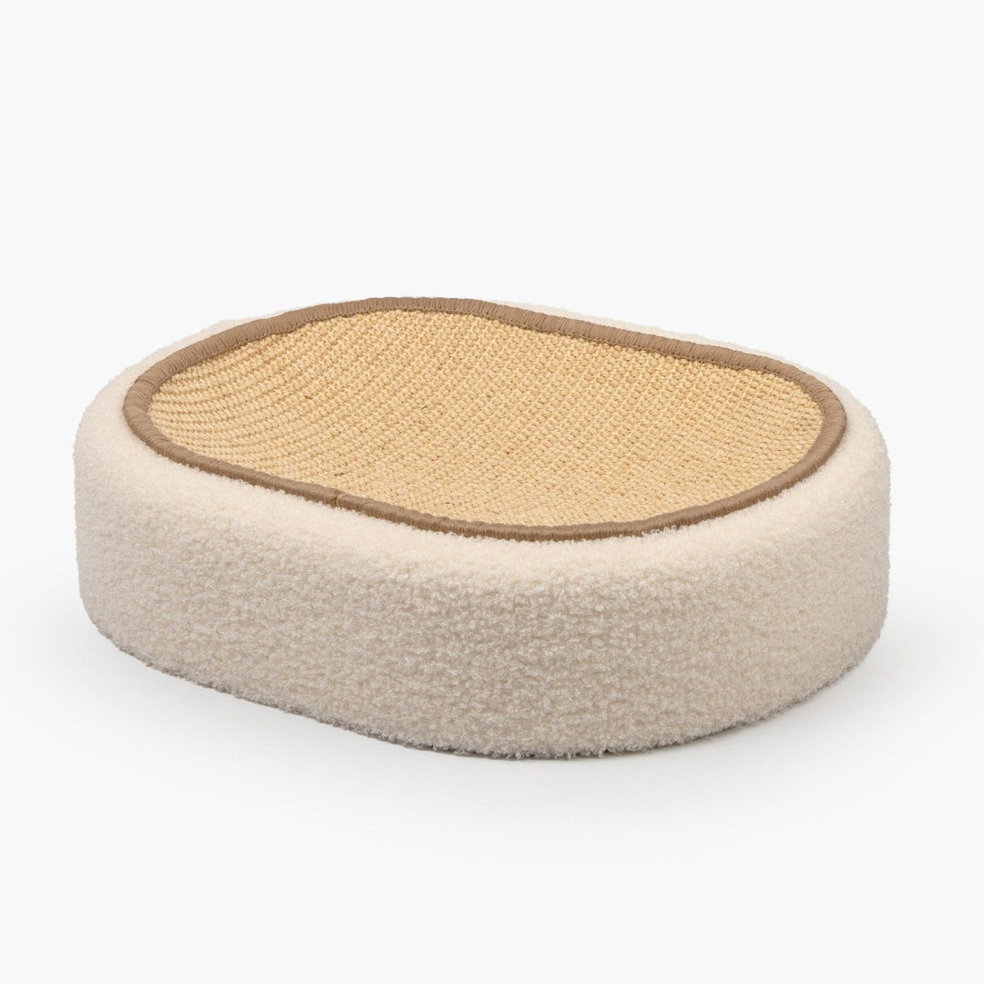 Oval sisal cat bed with scratching surface