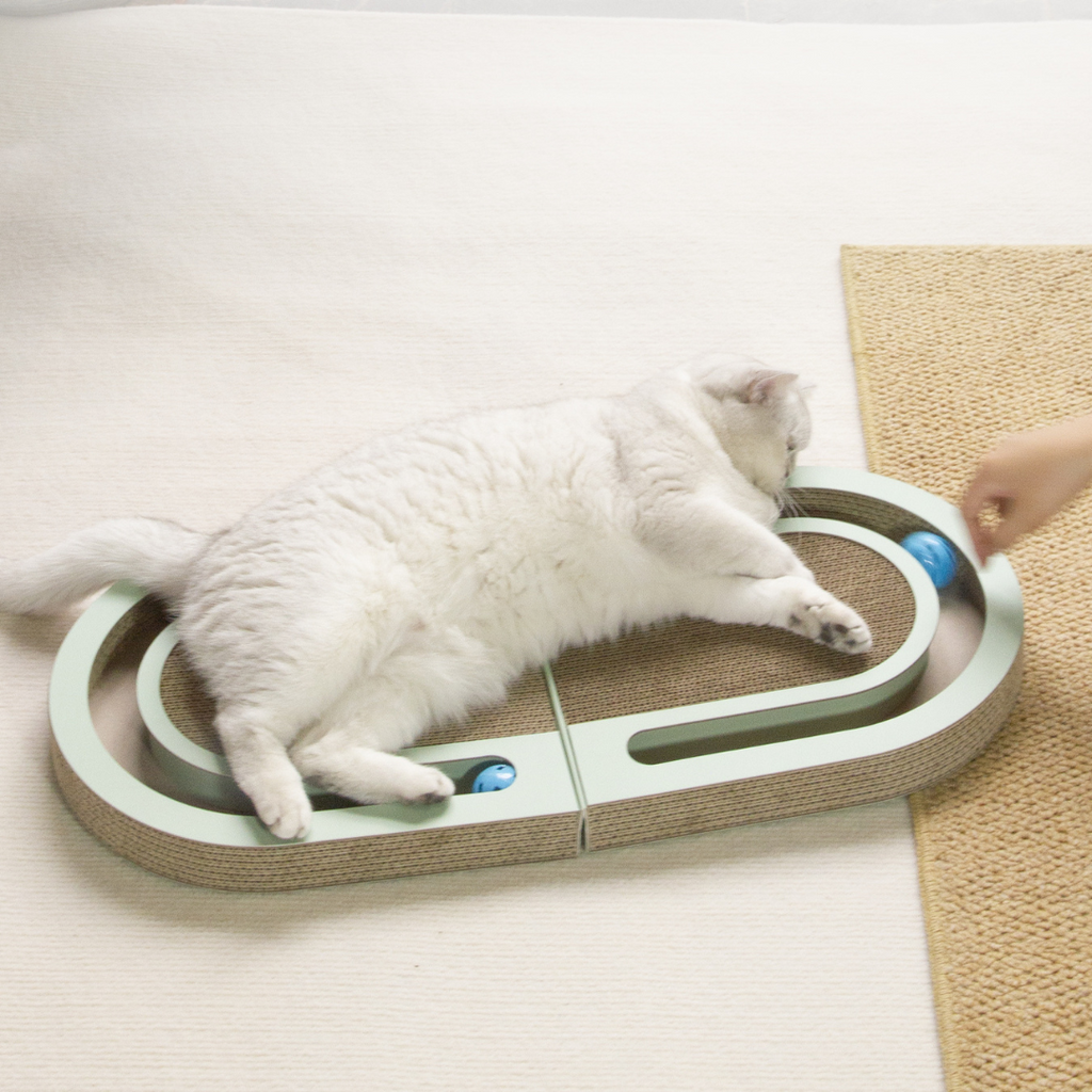 Cardboard cat scratcher with built-in ball track