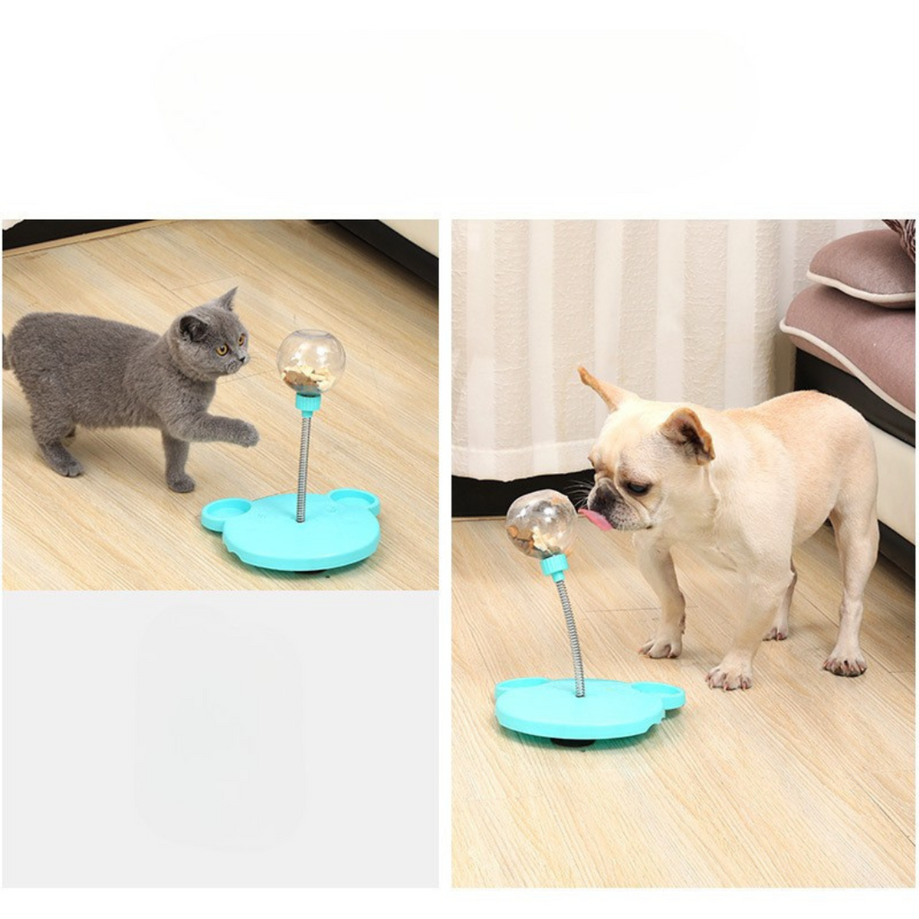 Dog playing with the wobbling treat toy