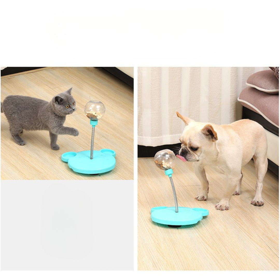 Dog playing with the wobbling treat toy