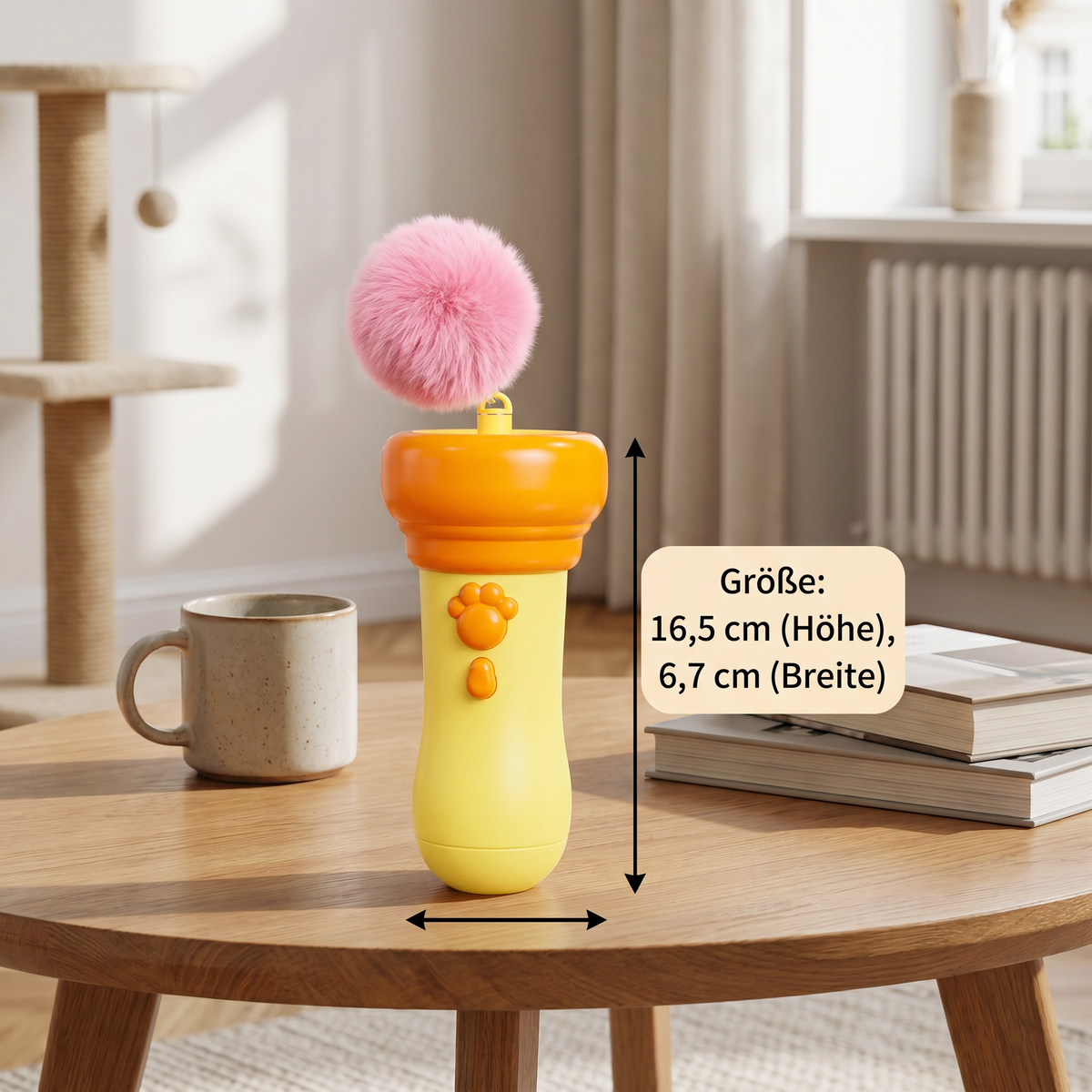 Cat playing with the pom-pom launcher