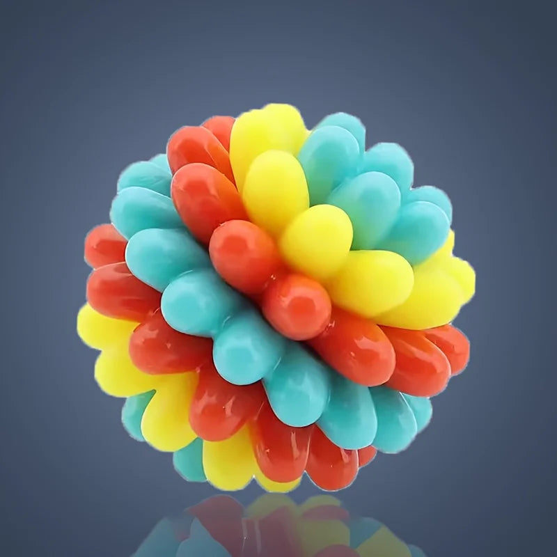 Colourful bumpy dog chew ball features