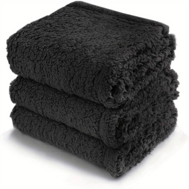 SnuggleFur blanket in grey, cream and black