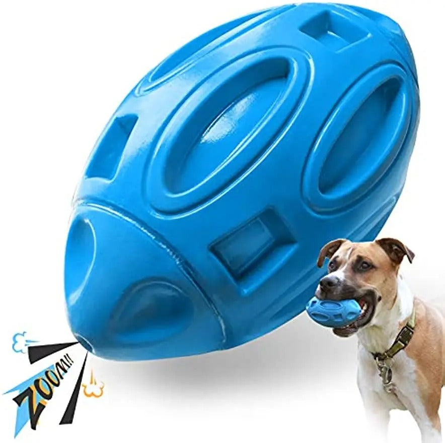 Dog chewing the reinforced squeaky toy