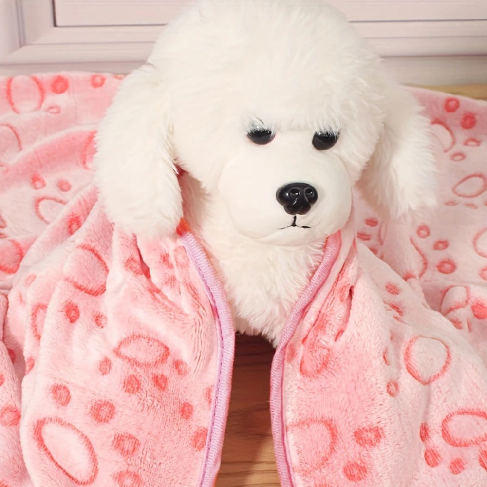 Dog snuggled under the plush pet blanket