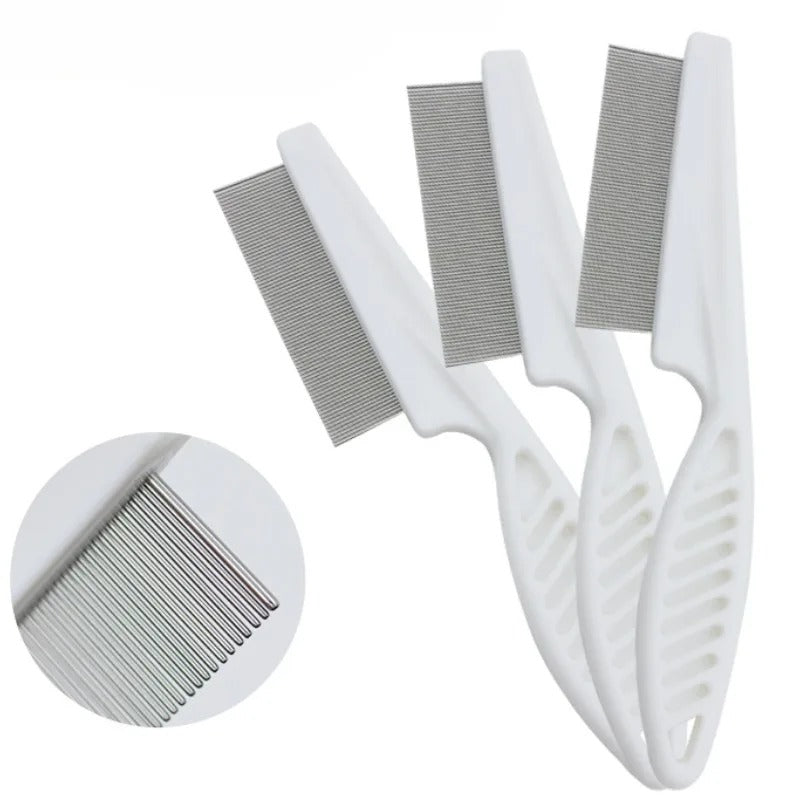 Combing a dog's coat with the stainless steel comb