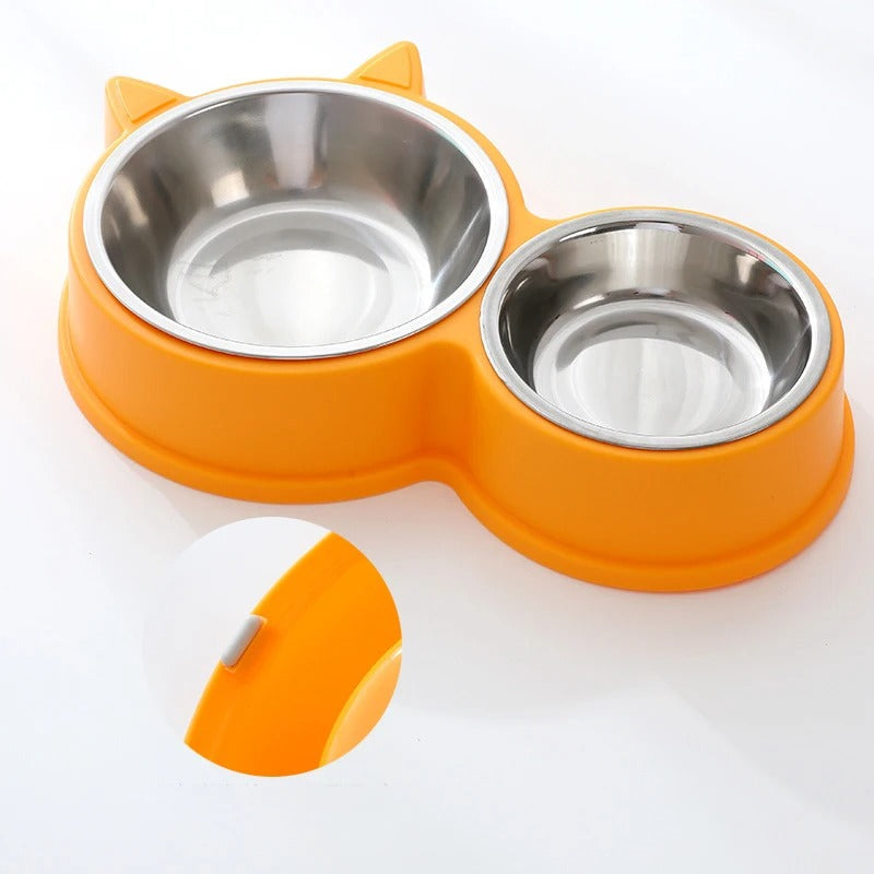 Kitten feeding from the PawFeeder set