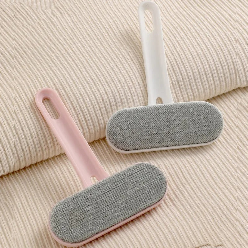Brushing a dog with the pet grooming brush