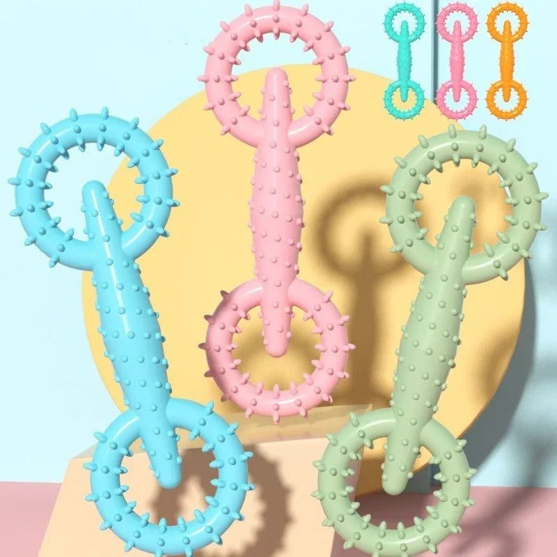 Dog tugging on the puppy tug ring toy