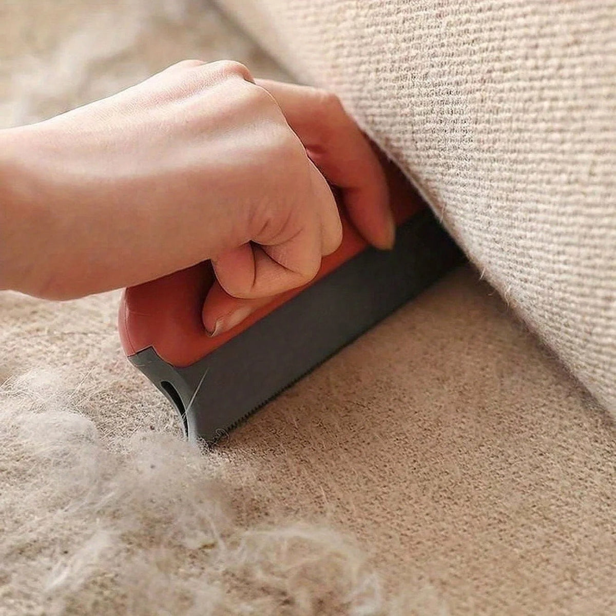 Pet Hair-Pro brush cleaning a car seat