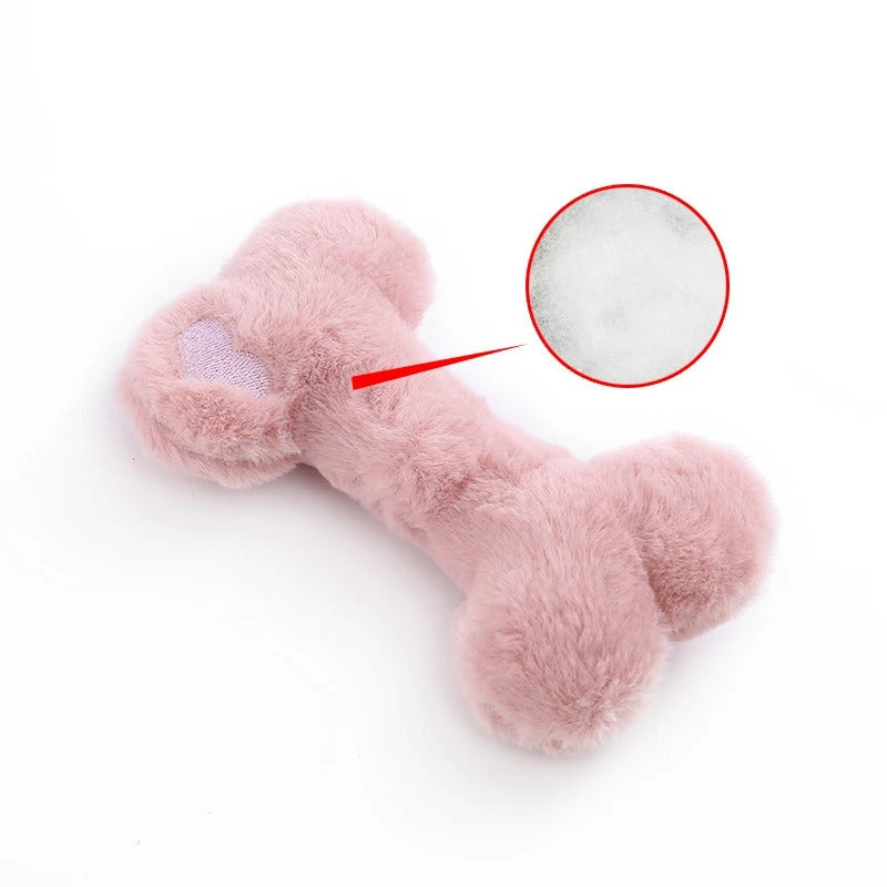 Close-up of the Love Bone plush bone toy