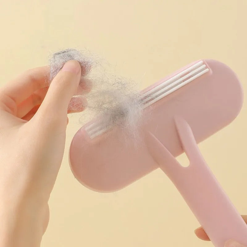 Pet grooming brush in pink