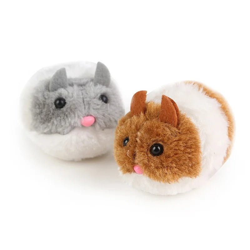 Cat pouncing on the cute mouse toy