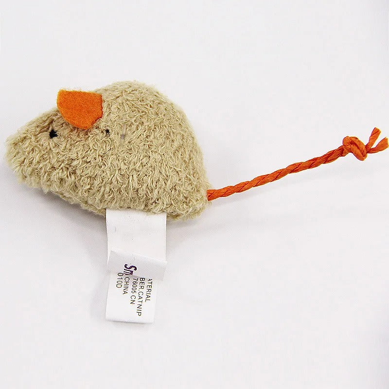 Cat carrying the plush mouse toy