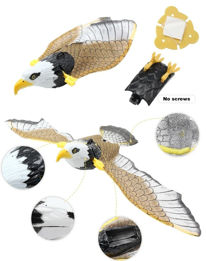 Cat pouncing at the flying bird toy