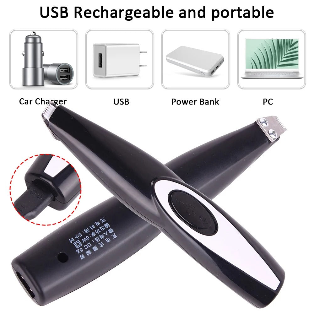 Pet hair trimmer held in hand for grooming