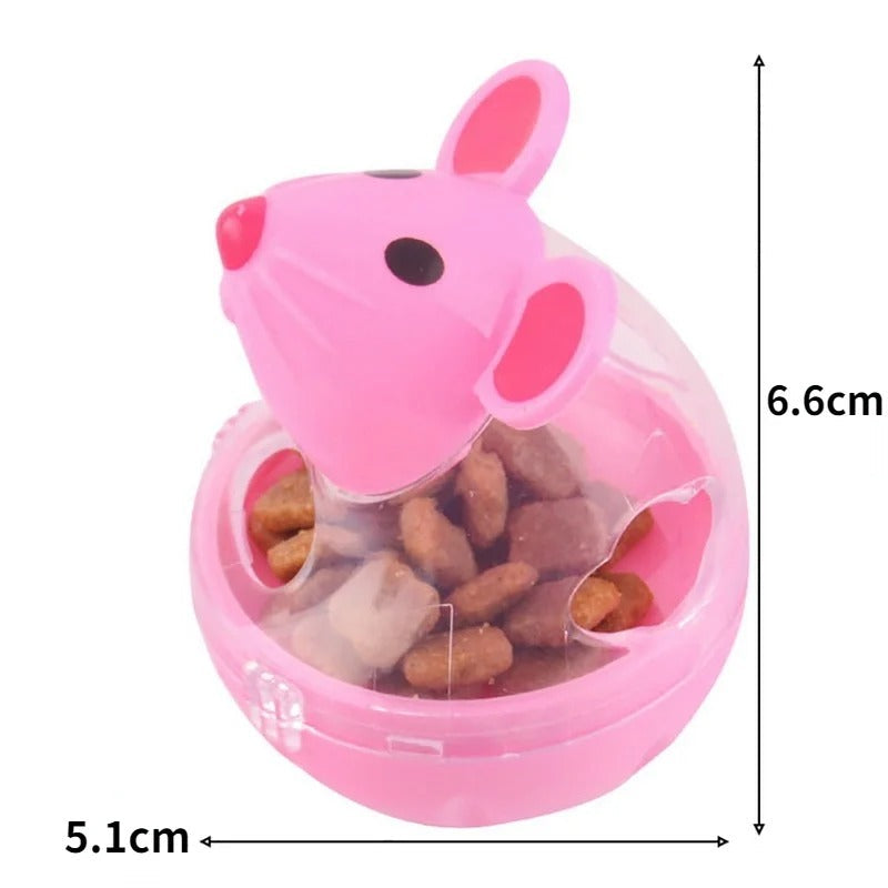 Cat chasing the rolling mouse treat toy