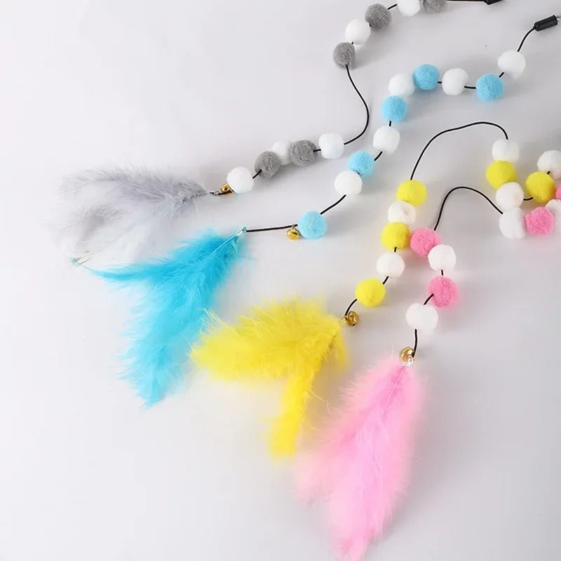 Retractable feather wand shown in all colours
