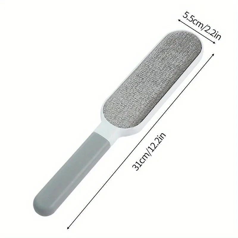 DustGone brush removing lint from clothing