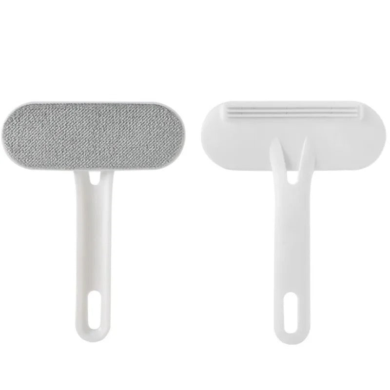 Pet grooming brush shown in both colours
