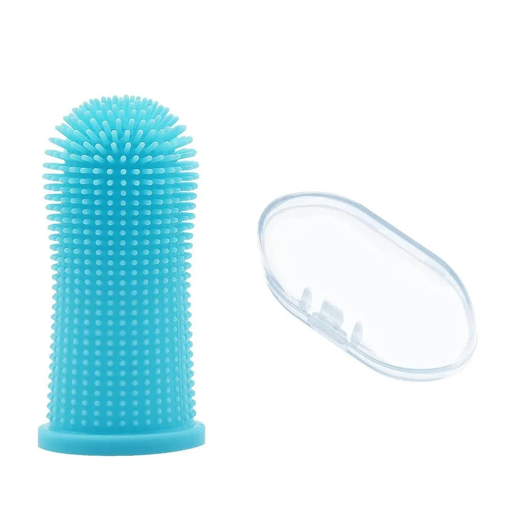 Finger toothbrush worn on a finger to brush a dog's teeth