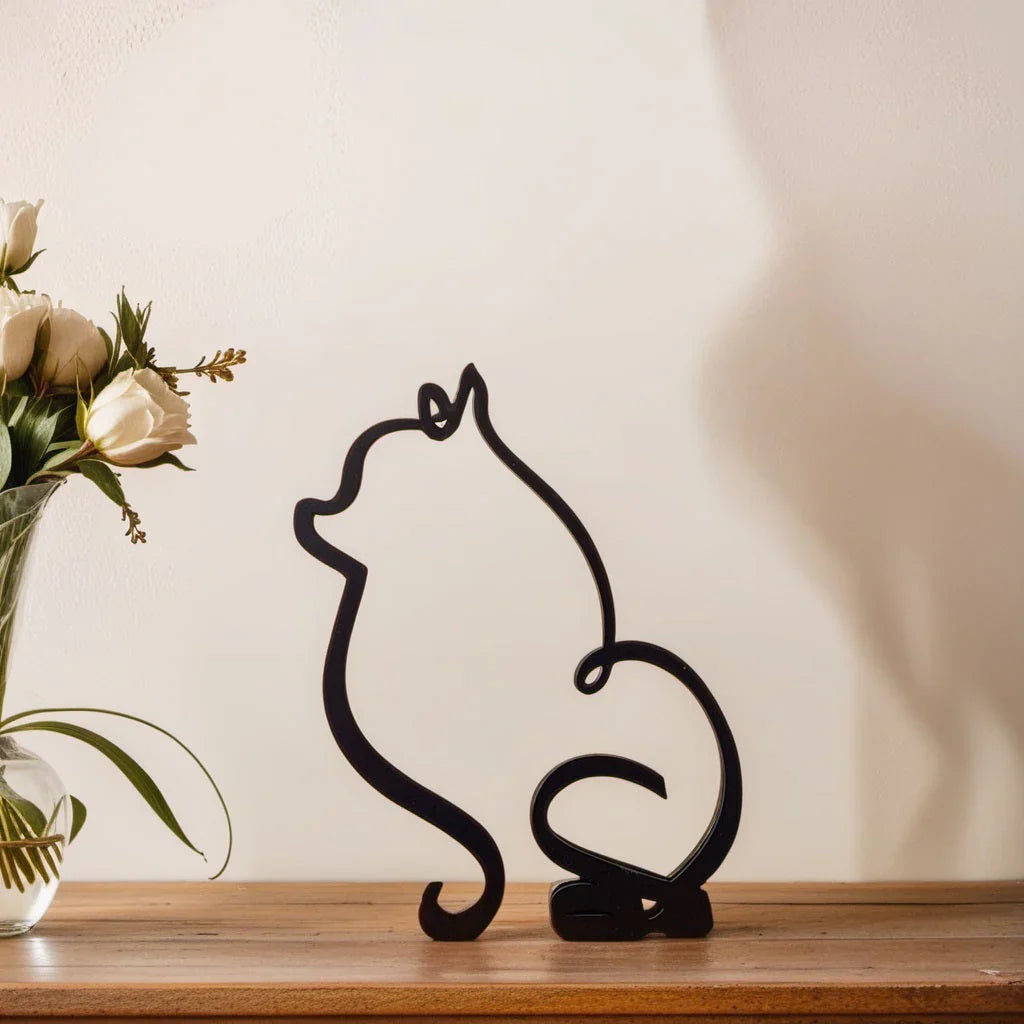 Dog breed sculpture collection on a shelf