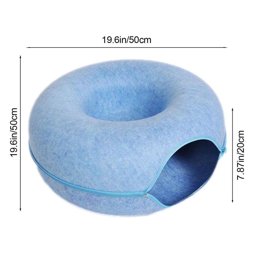 Donut bed zipped into the enclosed cave shape